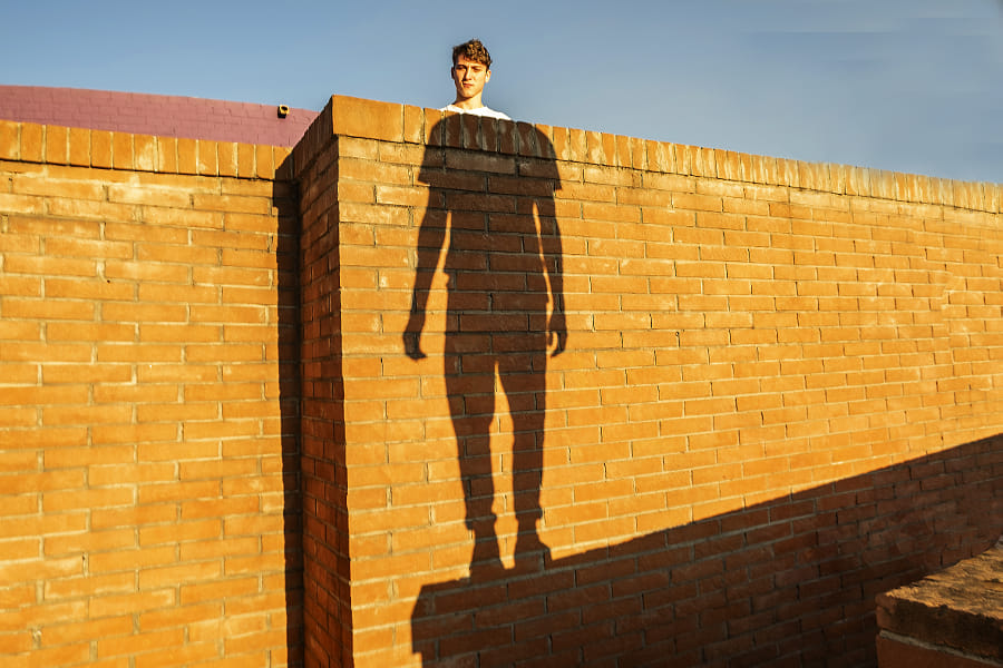 forced perspective minimalist photography shadow man by fabio gori
