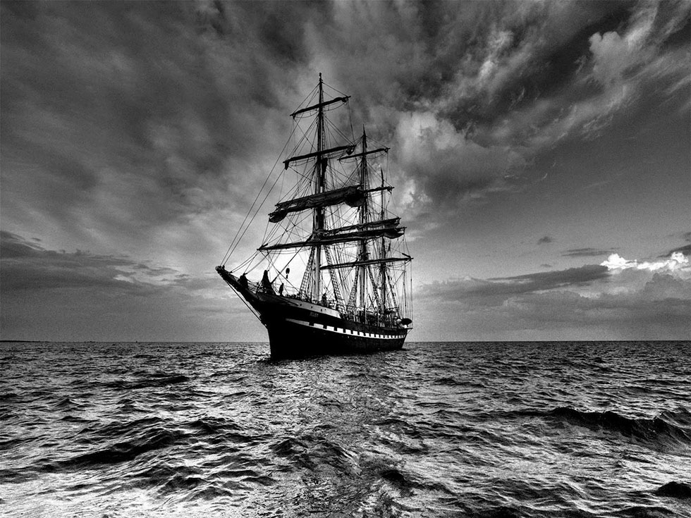 black white photography sailboat